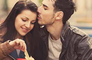 Young beautiful couple in the Luxembourg garden at fall. Paris,